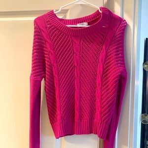 Magenta pullover sweater with cutouts